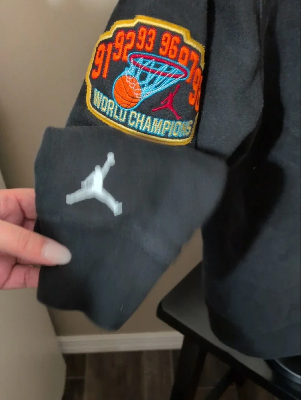 Jordan Black Hooded Sweatshirt with Orange and Blue Logo